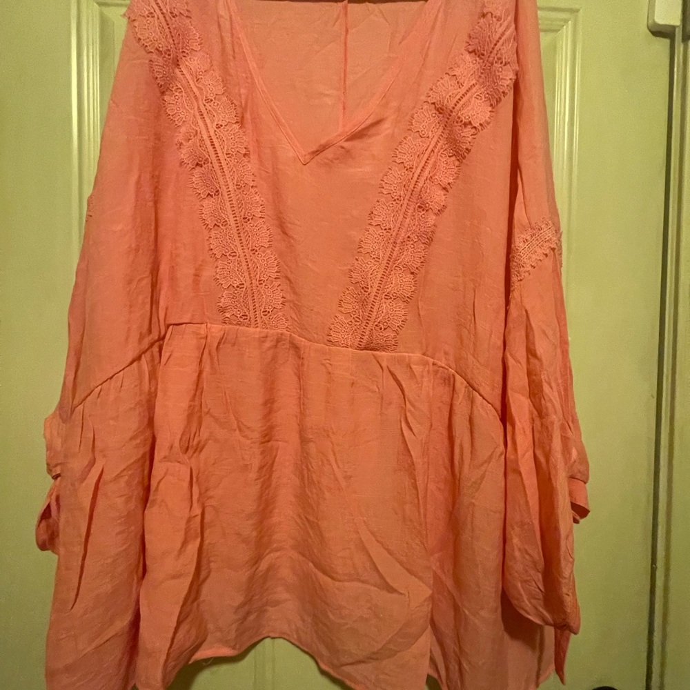 Be pretty in pink with this cute top. Perfect for the summer-light and cool!